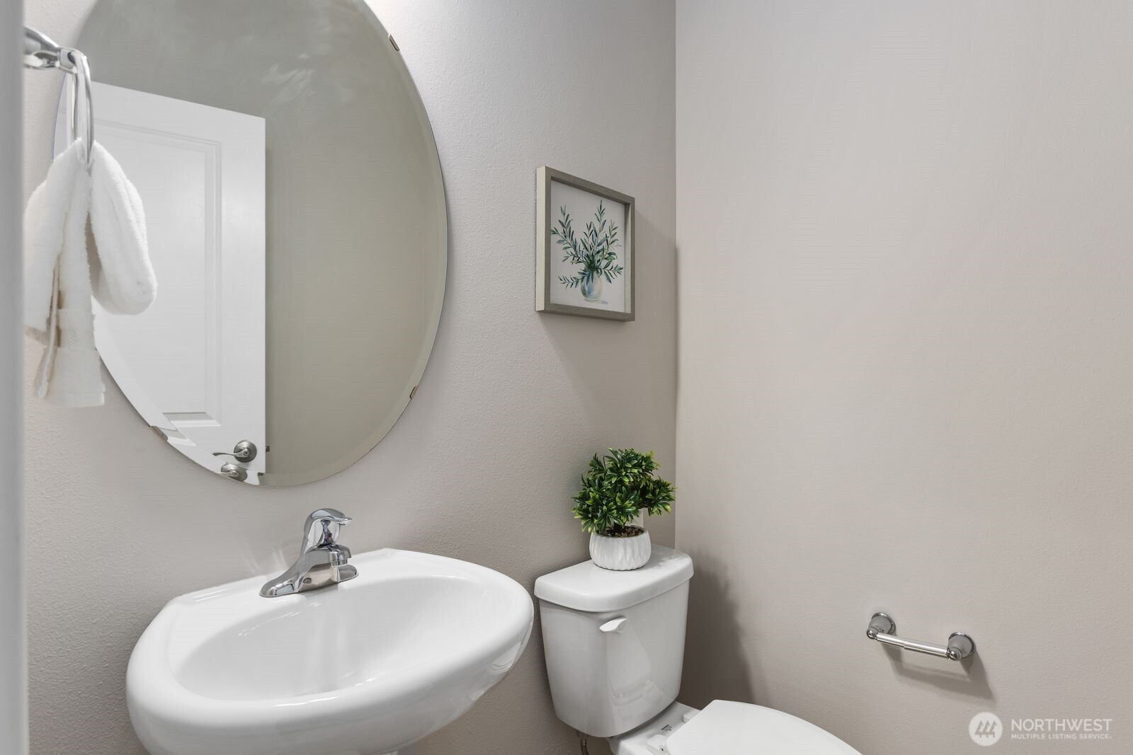 1621 Seattle Hill Road, Unit C4 Bothell, WA 98012 - Photo 16 of 35 a white toilet sitting next to a bathroom sink