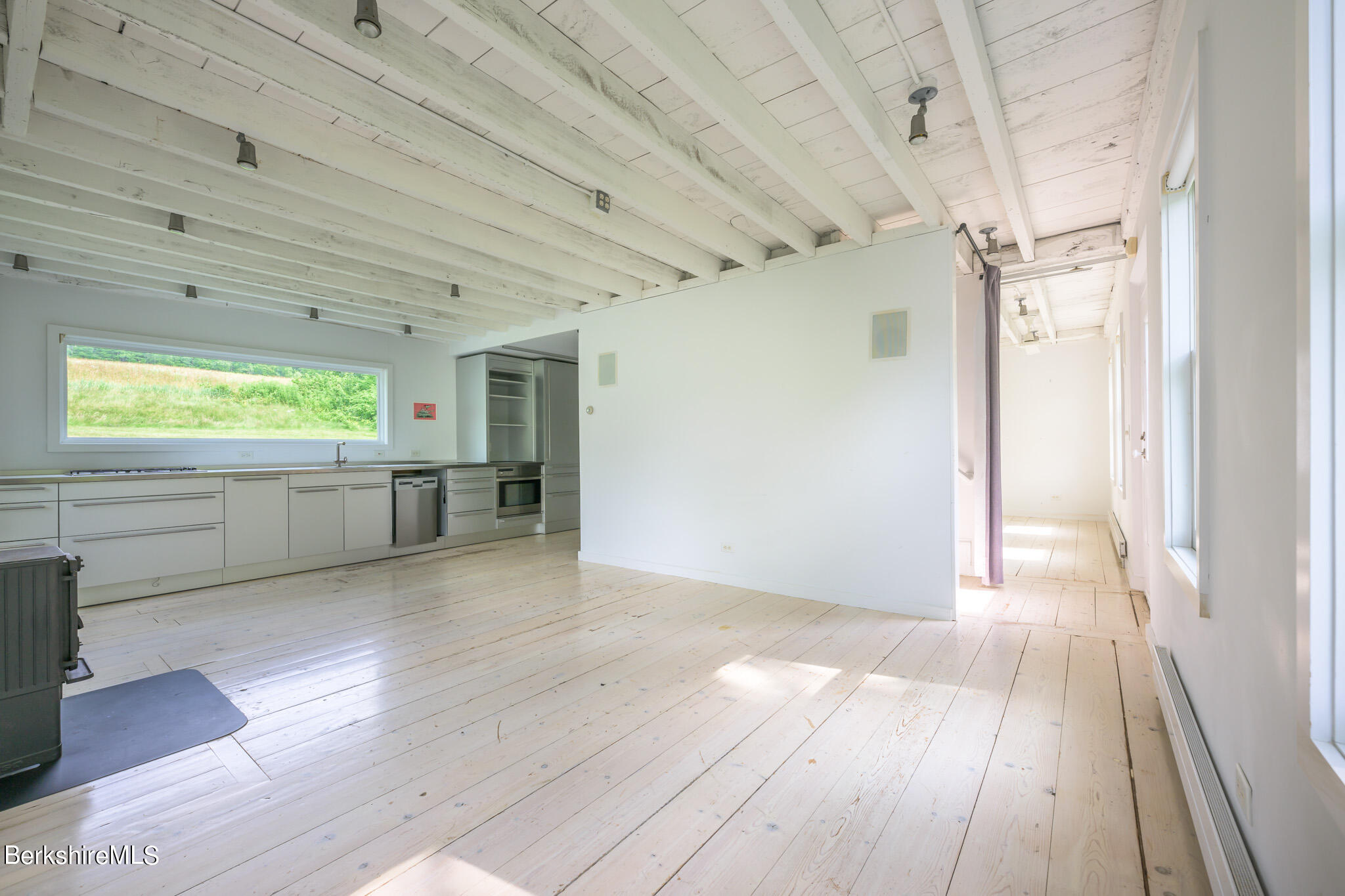 300 E Road Alford, MA 01266 - Photo 23 of 51 a view of an empty room with wooden floor and a window
