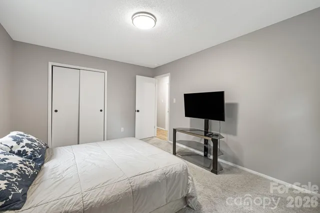 a view of a backyard with sitting area and slide