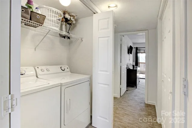 a bedroom with a large bed and a tv