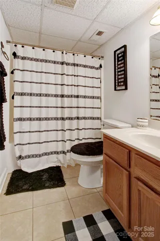 a view of a balcony with wooden floor