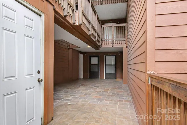 a backyard of a house with lots of green space and garden