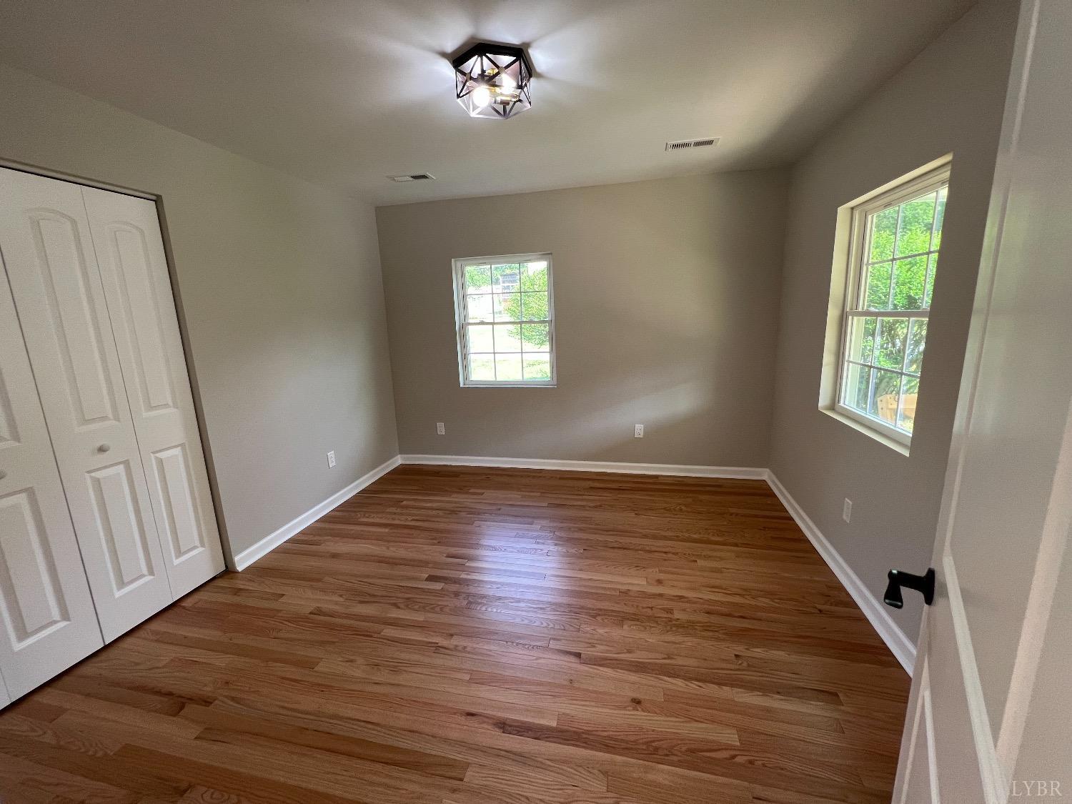 30 Sawmill Road Concord, VA 24538 - Photo 17 of 34 a view of an empty room with wooden floor and a window