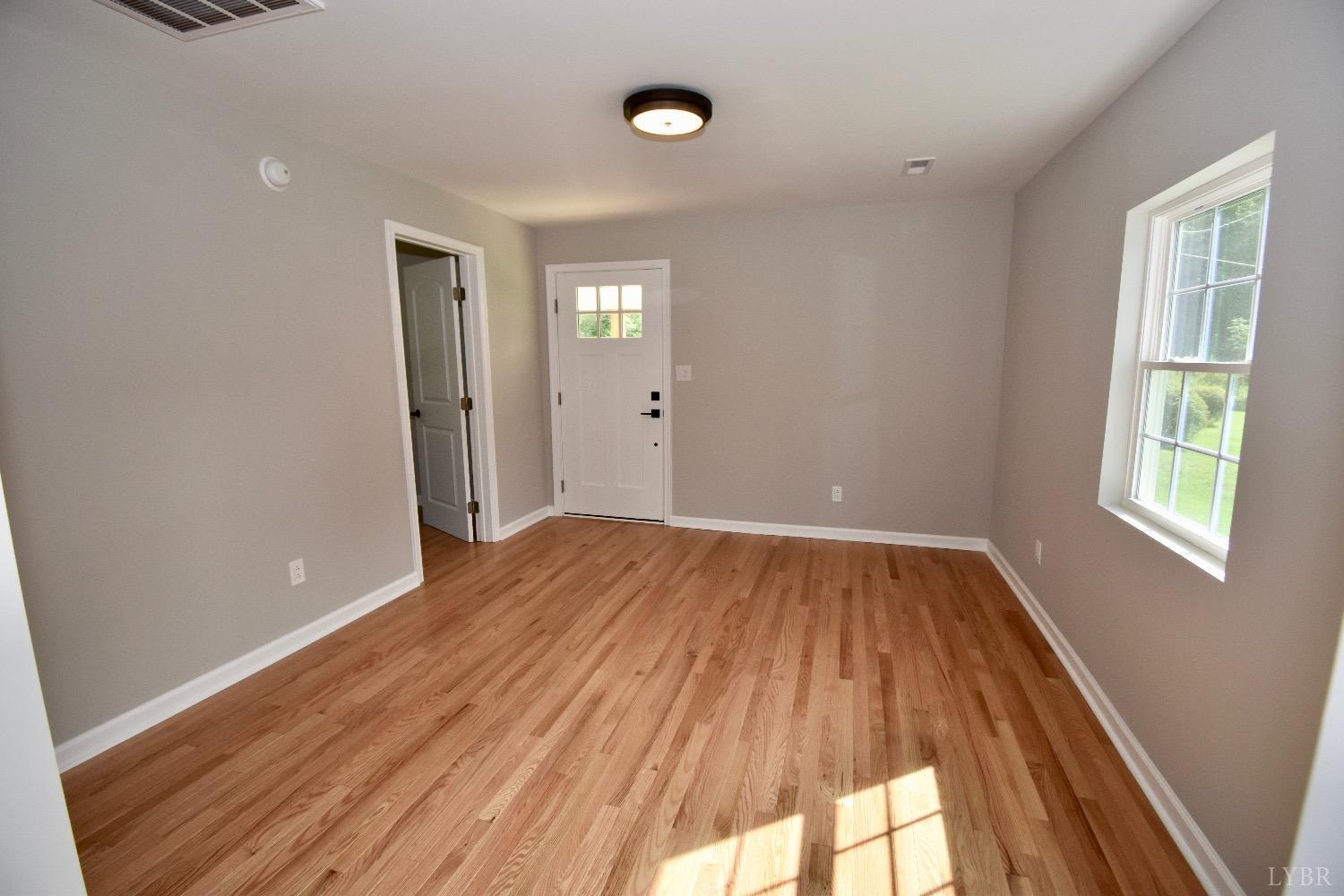 30 Sawmill Road Concord, VA 24538 - Photo 19 of 34 a view of a room with wooden floor and window
