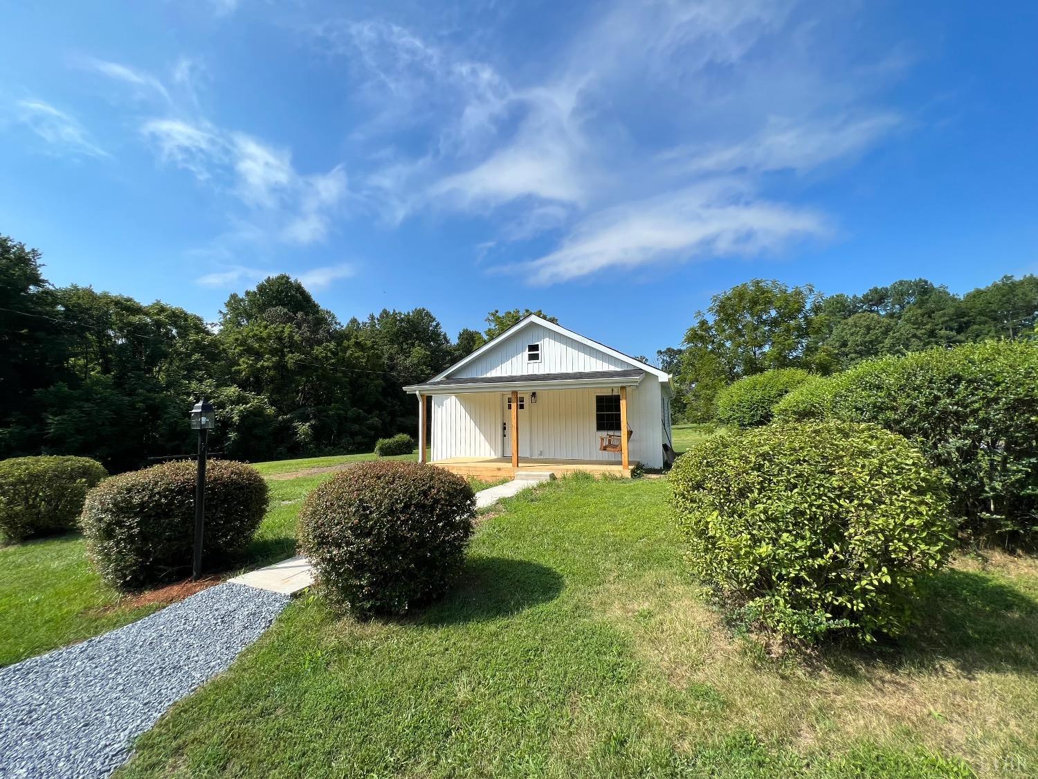 30 Sawmill Road Concord, VA 24538 - Photo 28 of 34 a view of a house with a yard and plants