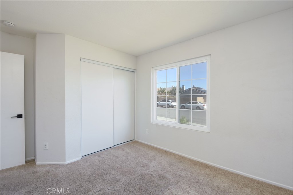 3714 Avondale Street Perris, CA 92571 - Photo 13 of 19 a view of an empty room with a window