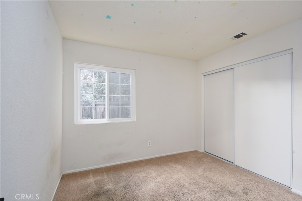 3714 Avondale Street Perris, CA 92571 - Photo 14 of 19 a view of an empty room with a window