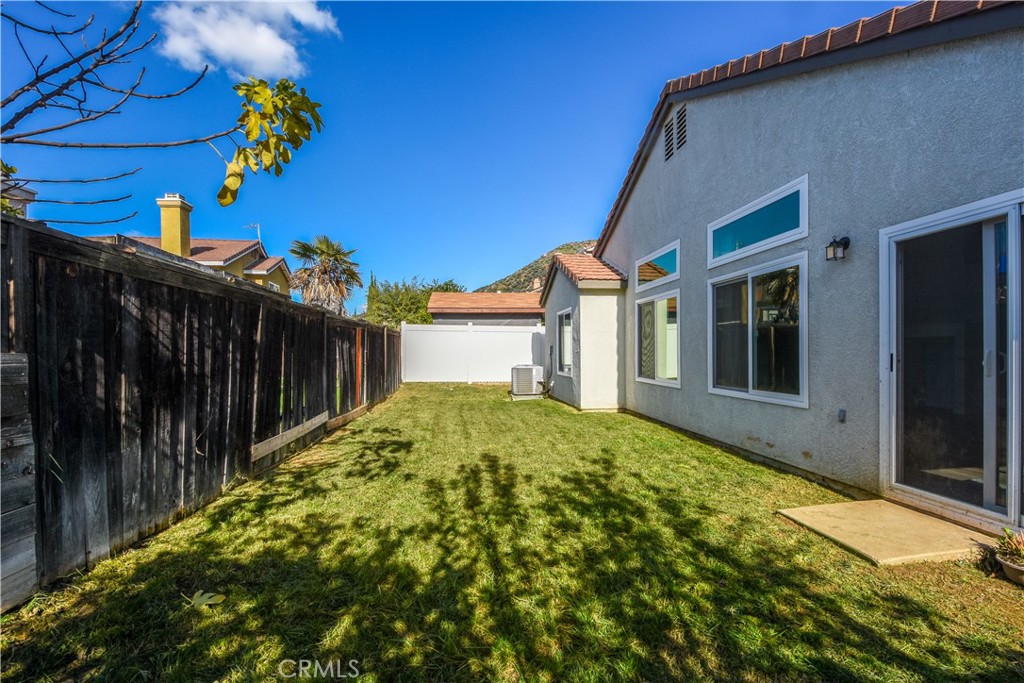 3714 Avondale Street Perris, CA 92571 - Photo 15 of 19 a view of a house with a backyard