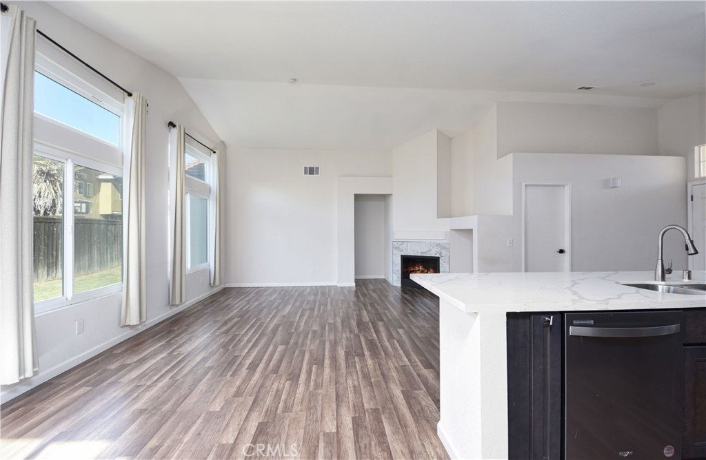 3714 Avondale Street Perris, CA 92571 - Photo 6 of 19 a view of kitchen and sink with cabinets