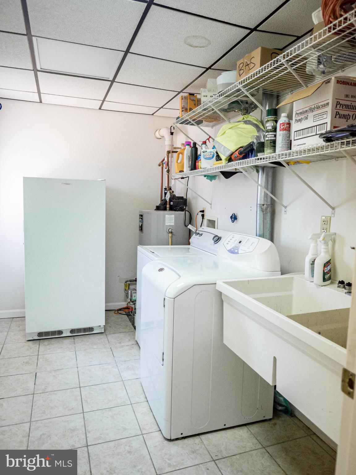620 Old Love Point Road Stevensville, MD 21666 - Photo 15 of 45 a utility room with dryer and washer