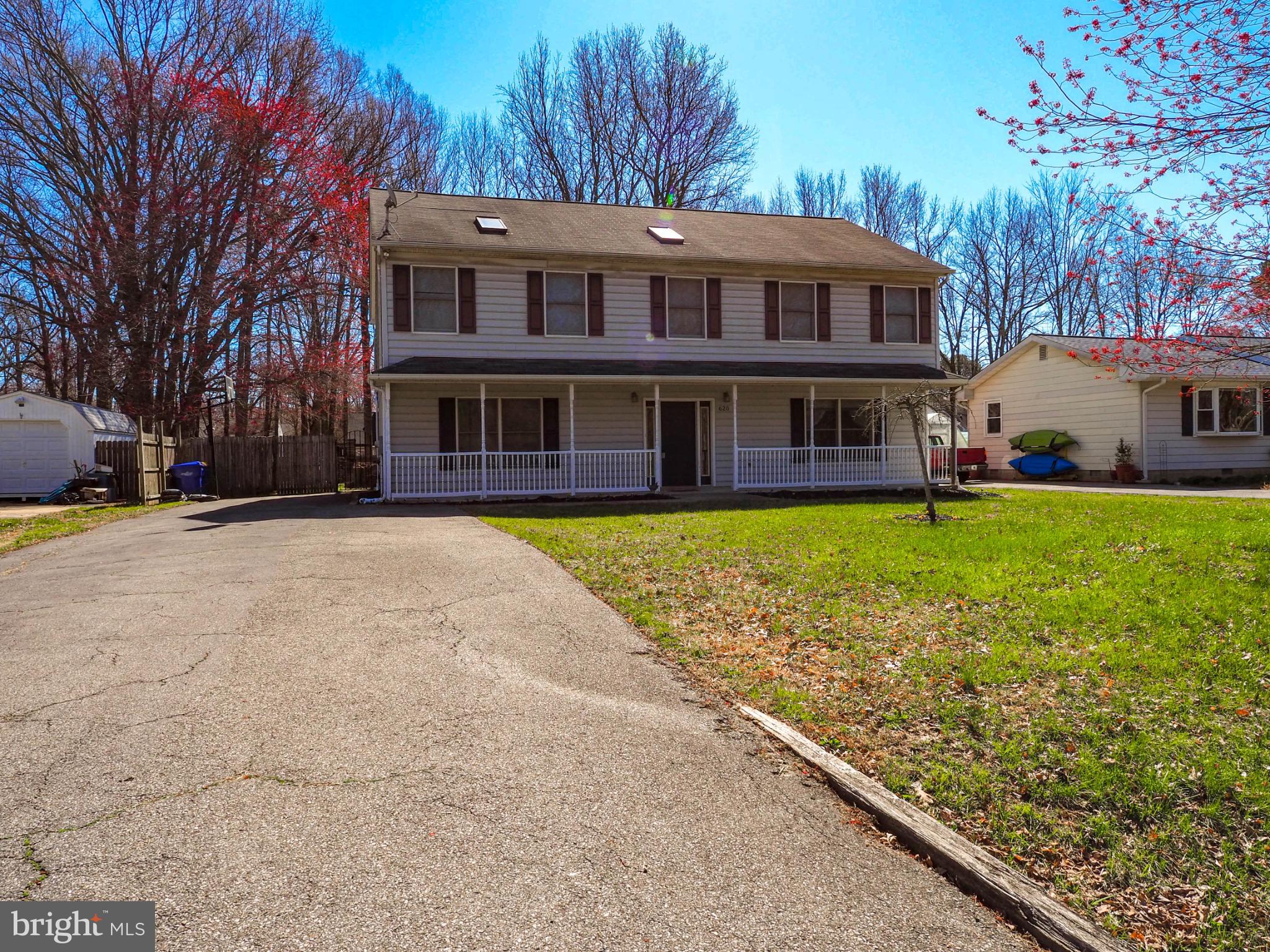 620 Old Love Point Road Stevensville, MD 21666 - Photo 2 of 45 a view of a house with a yard and sitting area
