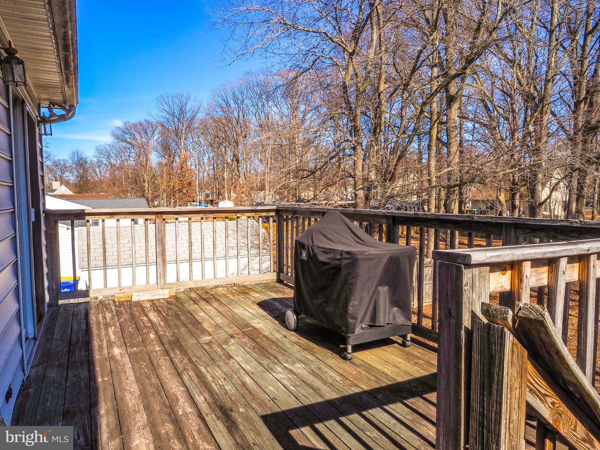 620 Old Love Point Road Stevensville, MD 21666 - Photo 25 of 45 a view of balcony with wooden floor and outdoor space