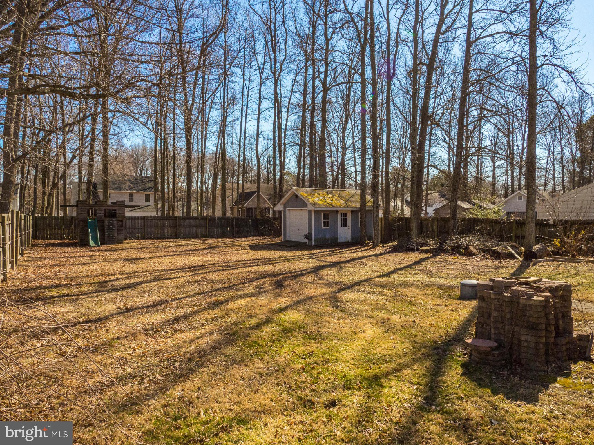 620 Old Love Point Road Stevensville, MD 21666 - Photo 27 of 45 a view of swimming pool with outdoor seating and covered with trees