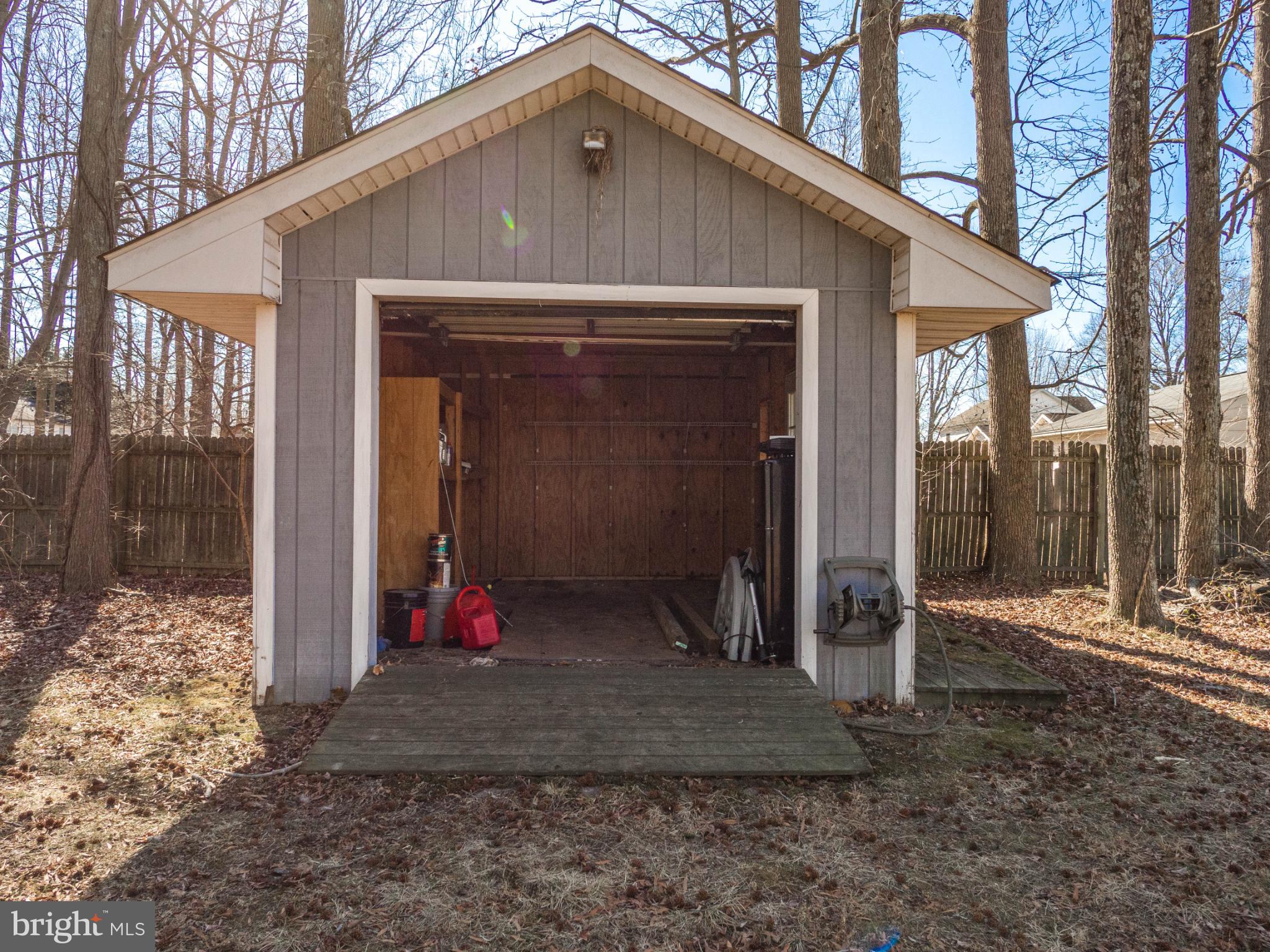620 Old Love Point Road Stevensville, MD 21666 - Photo 29 of 45 a front view of a house with a yard