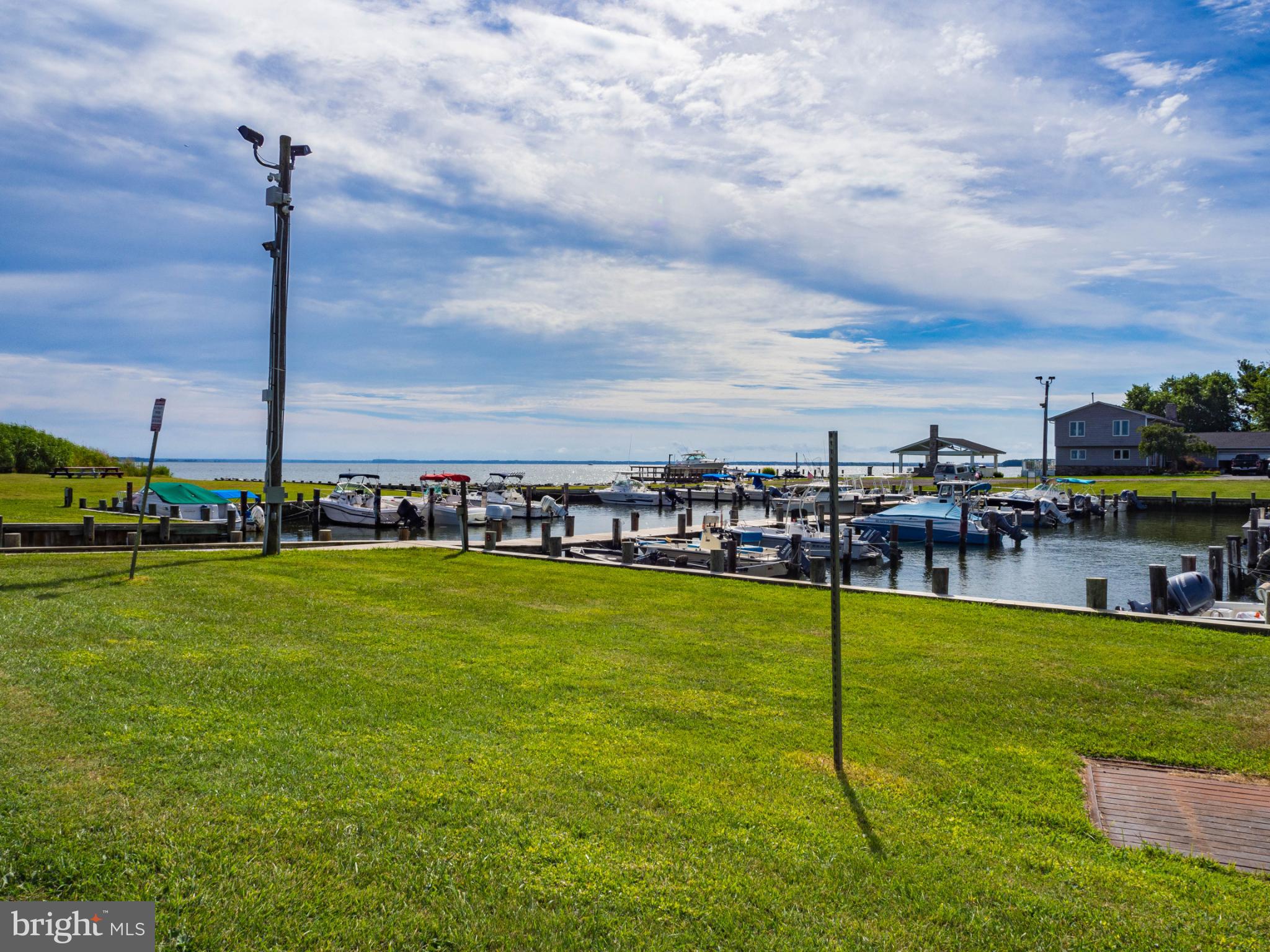 620 Old Love Point Road Stevensville, MD 21666 - Photo 30 of 45 a view of a swimming pool with a yard