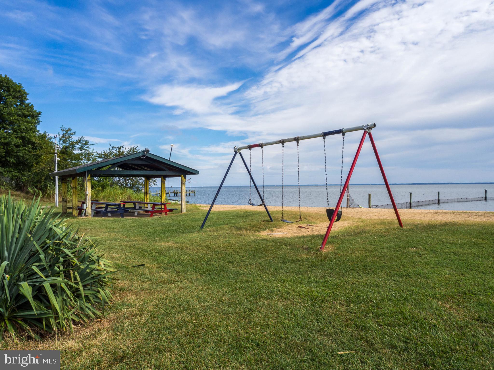 620 Old Love Point Road Stevensville, MD 21666 - Photo 33 of 45 a view of outdoor space with a big yard and entertaining space