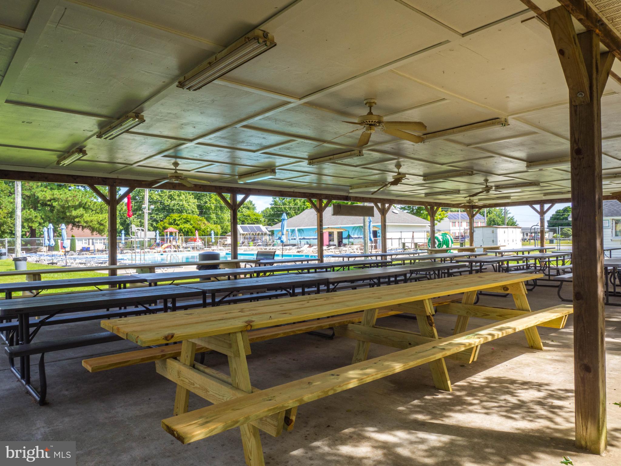 620 Old Love Point Road Stevensville, MD 21666 - Photo 40 of 45 a view of a swimming pool with a outdoor seating