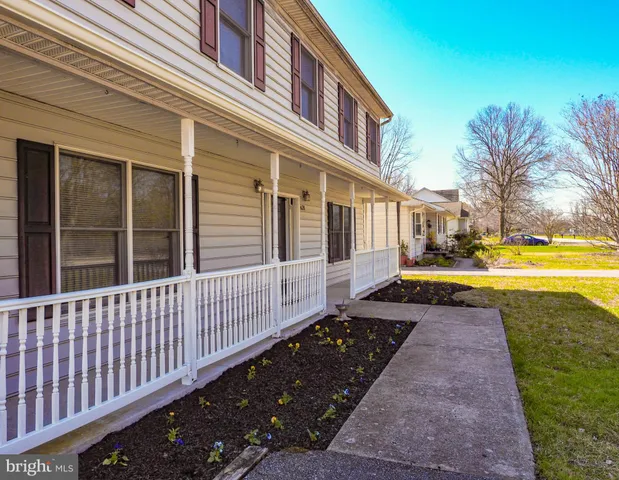 a view of a swimming pool with an outdoor space