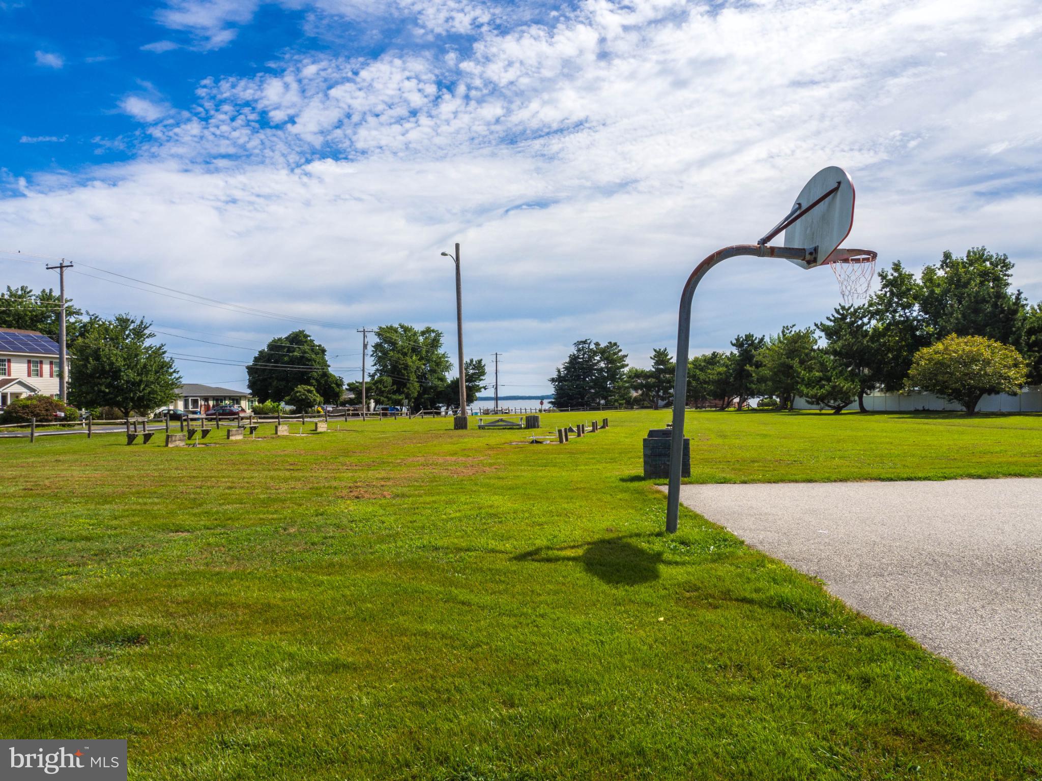 620 Old Love Point Road Stevensville, MD 21666 - Photo 41 of 45 a park view with swimming pool and green space