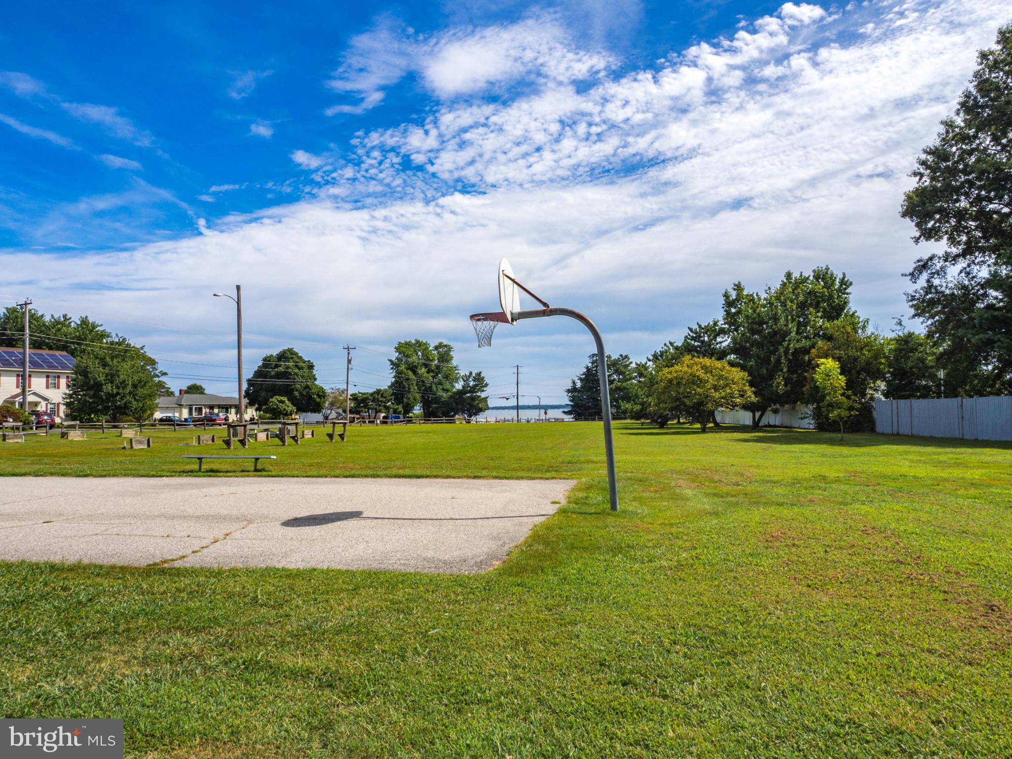 620 Old Love Point Road Stevensville, MD 21666 - Photo 43 of 45 a view of a garden with a bench