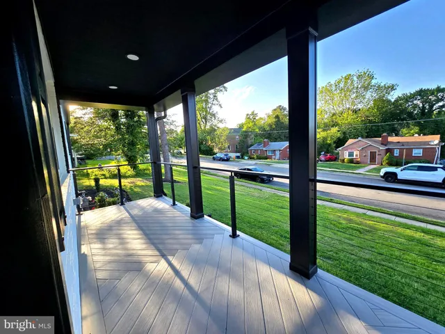 a view of swimming pool from a balcony