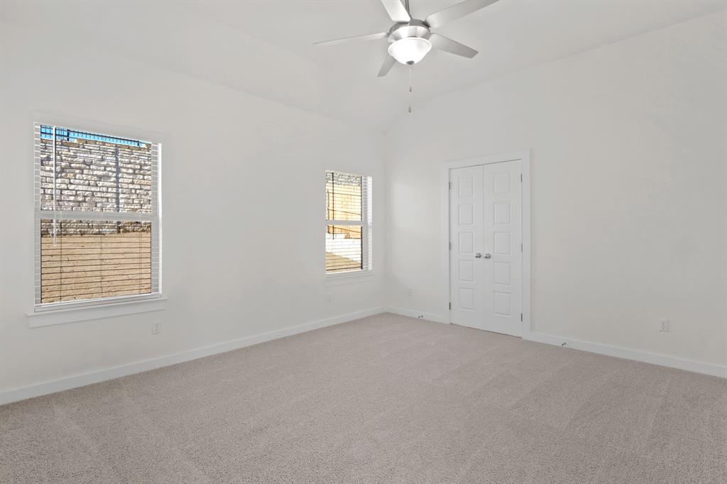 8336 Coastal Lane Pilot Point, TX 76258 - Photo 9 of 17 an empty room with a window