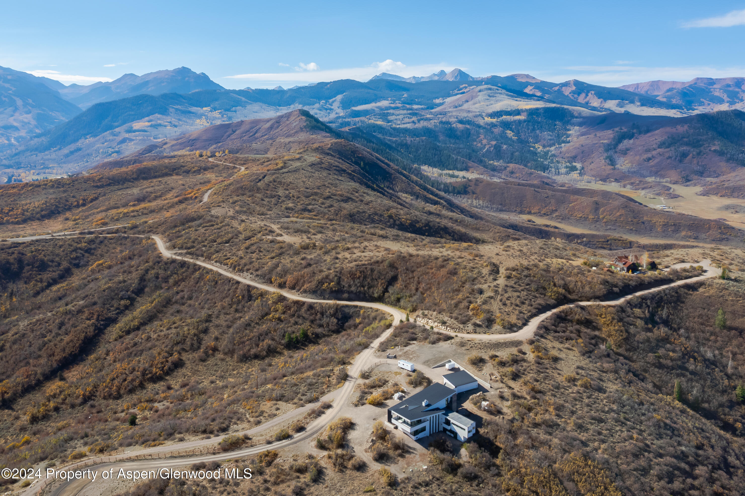0 Rabbit Way Snowmass, CO 81654 - Photo 20 of 23 a view of a backyard with wooden fence