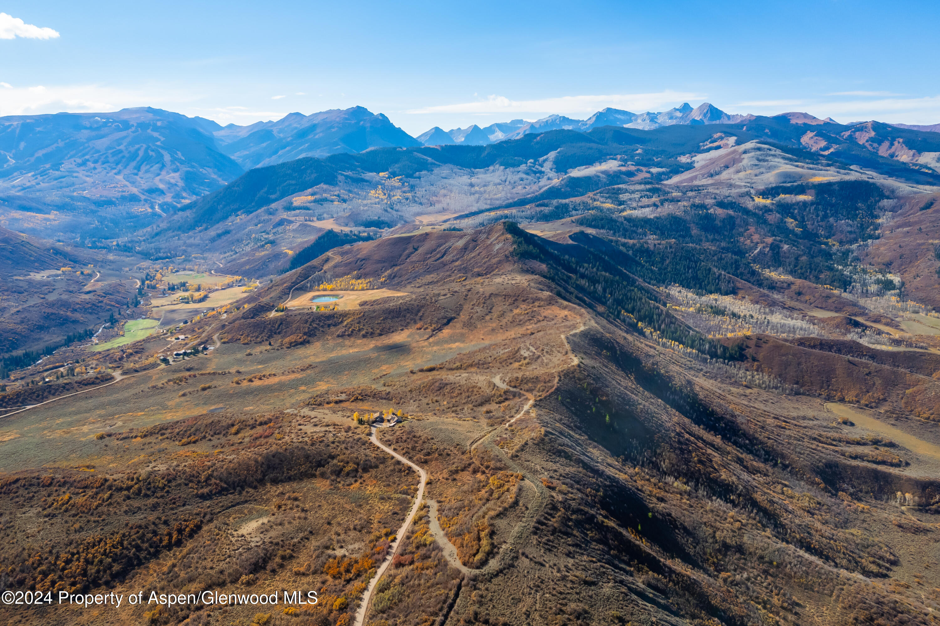 0 Rabbit Way Snowmass, CO 81654 - Photo 21 of 23 a view of a backyard with wooden fence