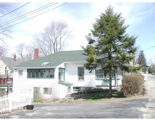 6 Decatur Street Gloucester, MA 01930 - Photo 3 of 13 a front view of a house with a yard