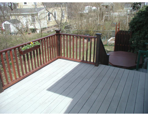 6 Decatur Street Gloucester, MA 01930 - Photo 4 of 13 a balcony with wooden floor