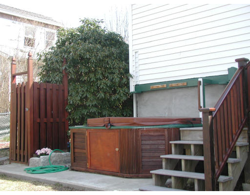 6 Decatur Street Gloucester, MA 01930 - Photo 5 of 13 a view of backyard with a deck and a potted plant
