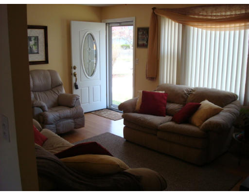 105 Cuff Avenue Springfield, MA 01104 - Photo 4 of 14 a living room with furniture and a large window