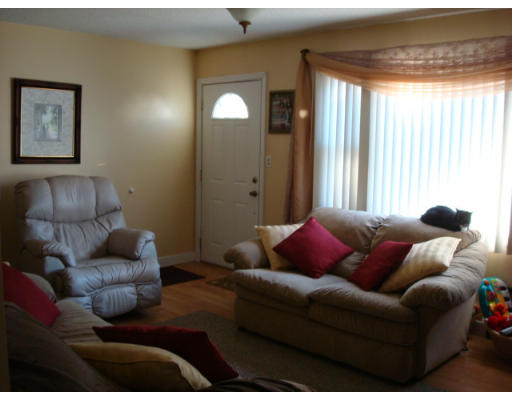 105 Cuff Avenue Springfield, MA 01104 - Photo 5 of 14 a living room with furniture and a large window