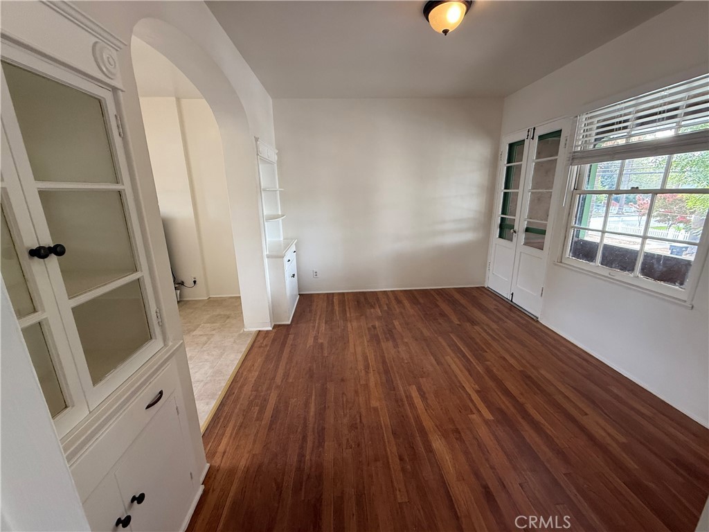 4121 4th Street Riverside, CA 92501 - Photo 20 of 25 wooden floor in an empty room with a window