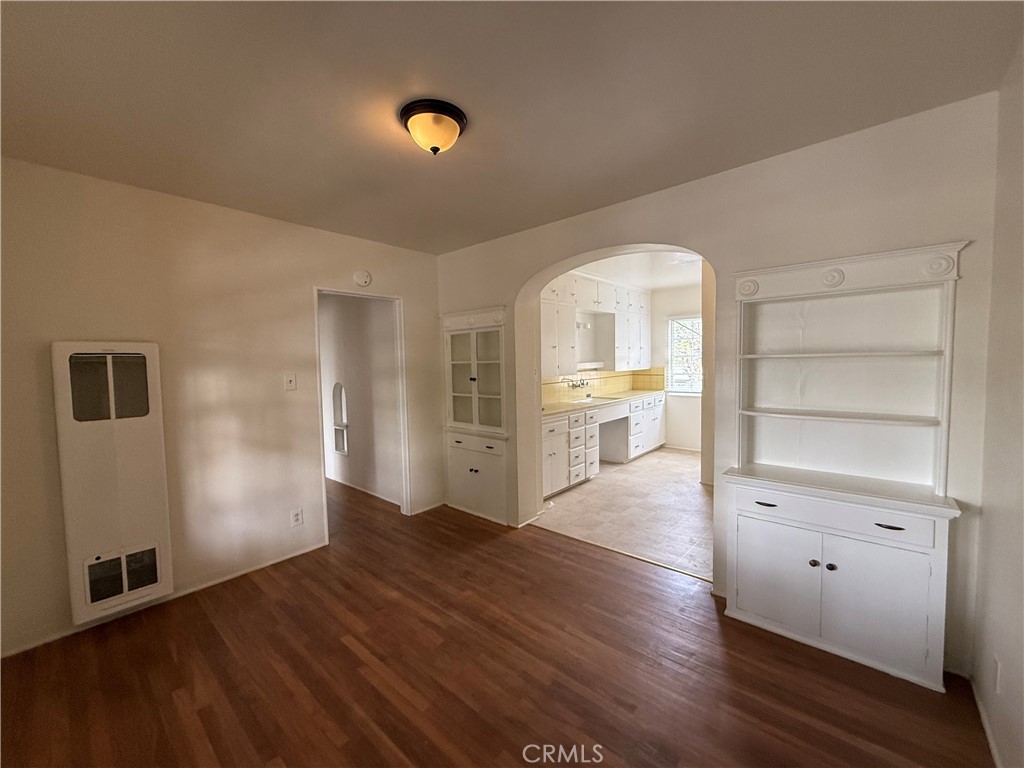 4121 4th Street Riverside, CA 92501 - Photo 21 of 25 a view of a room with wooden floor closet and windows