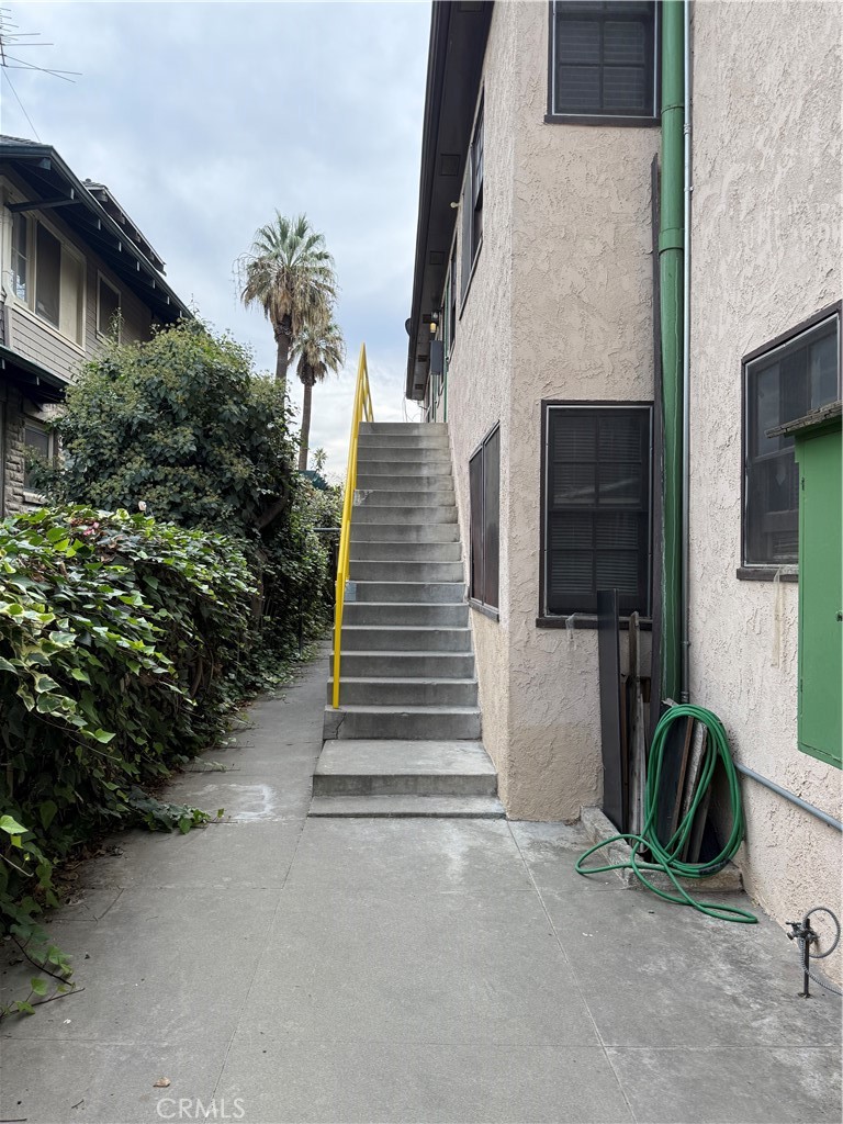 4121 4th Street Riverside, CA 92501 - Photo 4 of 25 a view of a house with backyard and trees