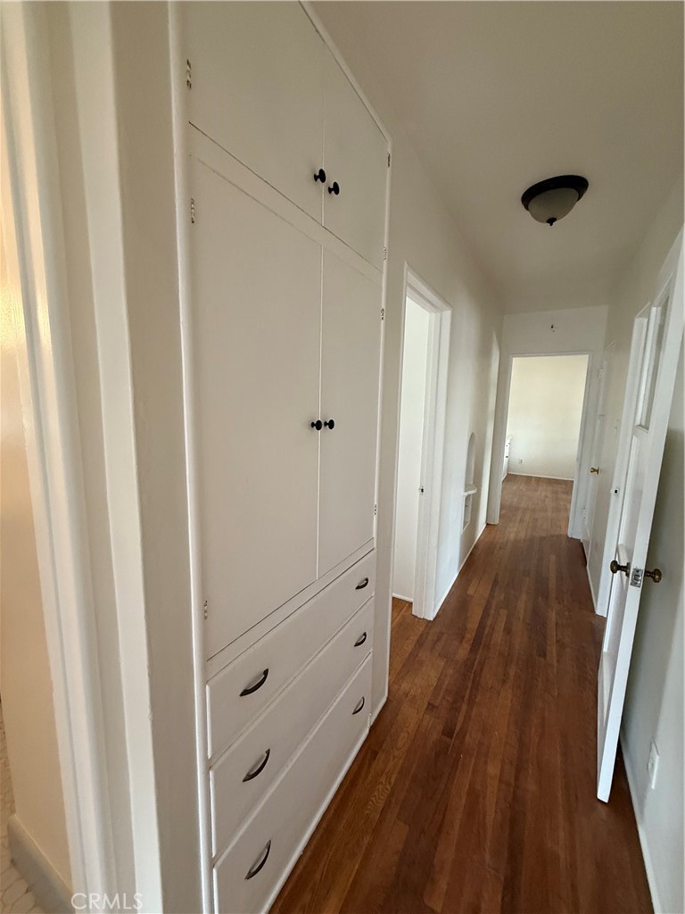 4121 4th Street Riverside, CA 92501 - Photo 9 of 25 a view of a hallway with wooden floor and staircase