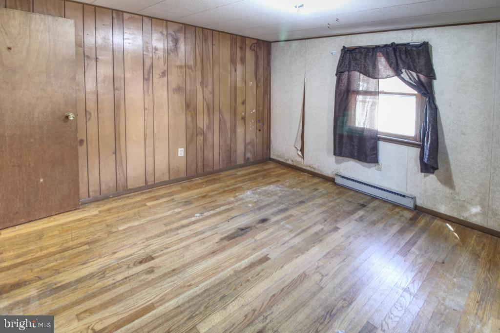 4417 Buffalo Road Mount Airy, MD 21771 - Photo 22 of 30 Cozy room with warm wooden accents.