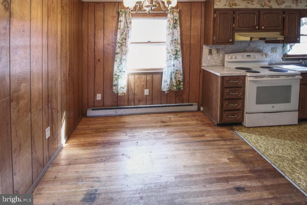 4417 Buffalo Road Mount Airy, MD 21771 - Photo 8 of 30 Cozy kitchen with rustic wooden charm.