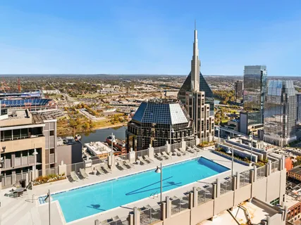 a view of a city with lawn chairs