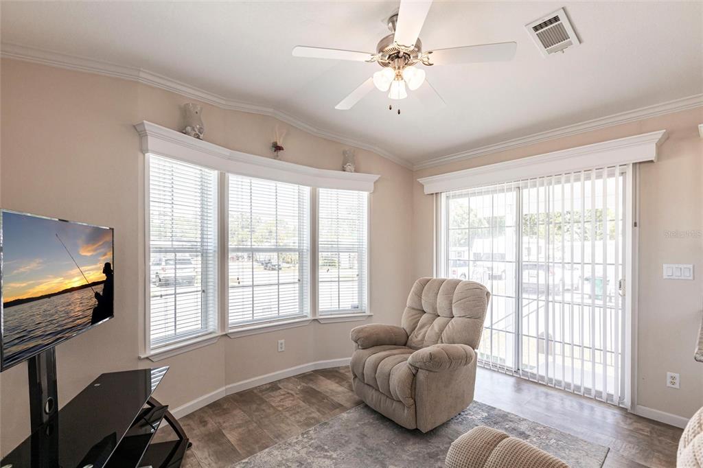 1329 Trout Punta Gorda, FL 33950 - Photo 7 of 38 a living room with furniture and a flat screen tv