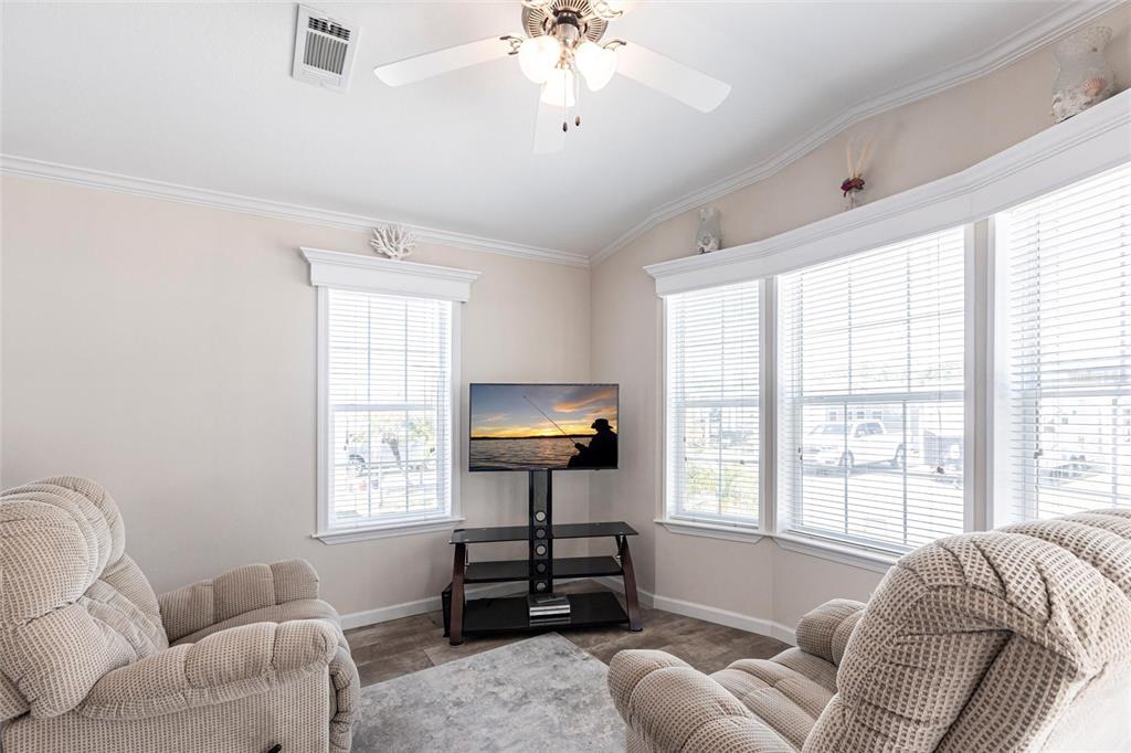 1329 Trout Punta Gorda, FL 33950 - Photo 8 of 38 a living room with furniture and a window