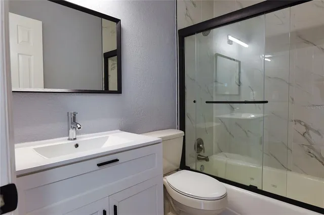 a view of a kitchen with a sink