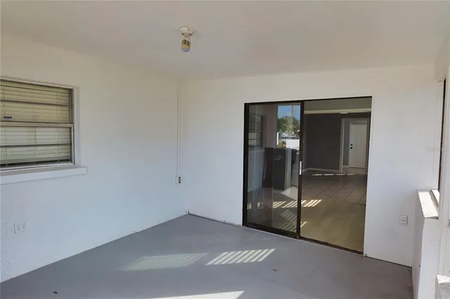 a view of an empty room with window