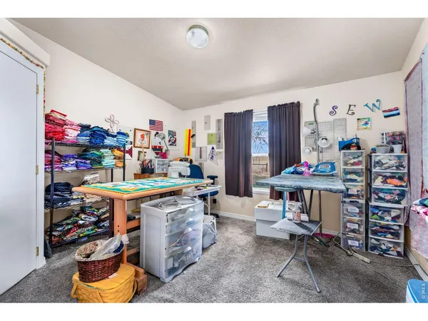a utility room with lots of wooden furniture