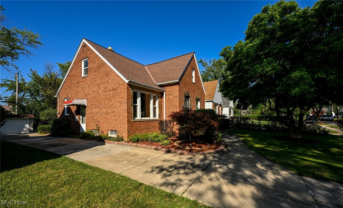 4033 Wyncote Road South Euclid, OH 44121 - Photo 3 of 25 View of home's exterior with a yard