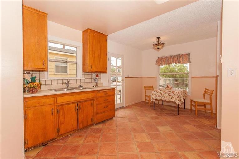 445 Charles Street Moorpark, CA 93021 - Photo 2 of 24 a large bathroom with a sink mirror and a bathtub