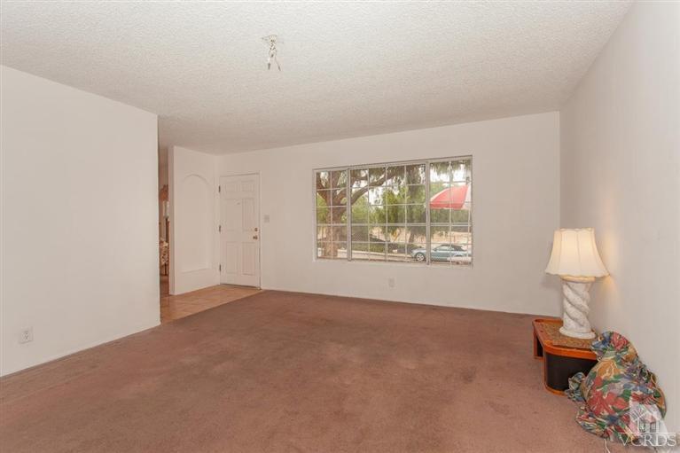 445 Charles Street Moorpark, CA 93021 - Photo 3 of 24 an empty room with windows