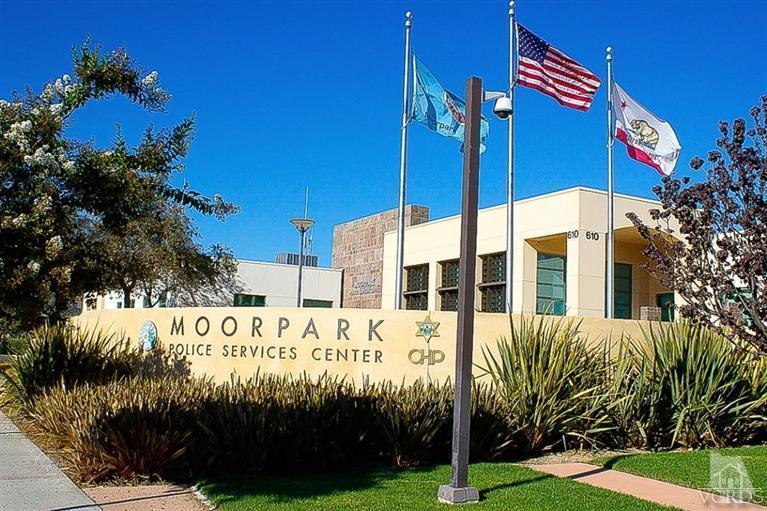 445 Charles Street Moorpark, CA 93021 - Photo 22 of 24 a street sign on the side of building