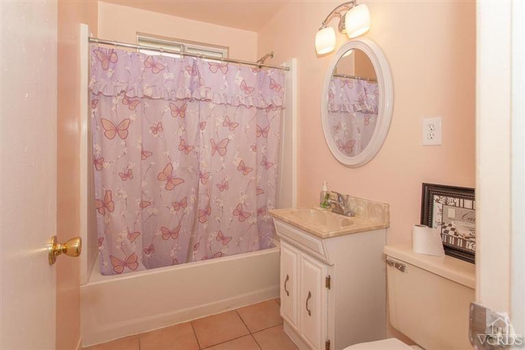 445 Charles Street Moorpark, CA 93021 - Photo 4 of 24 a bathroom with a sink a toilet and a bathtub